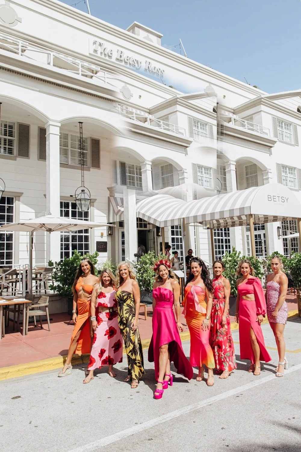 The Summit women standing together on Ocean Drive in front of The Betsy